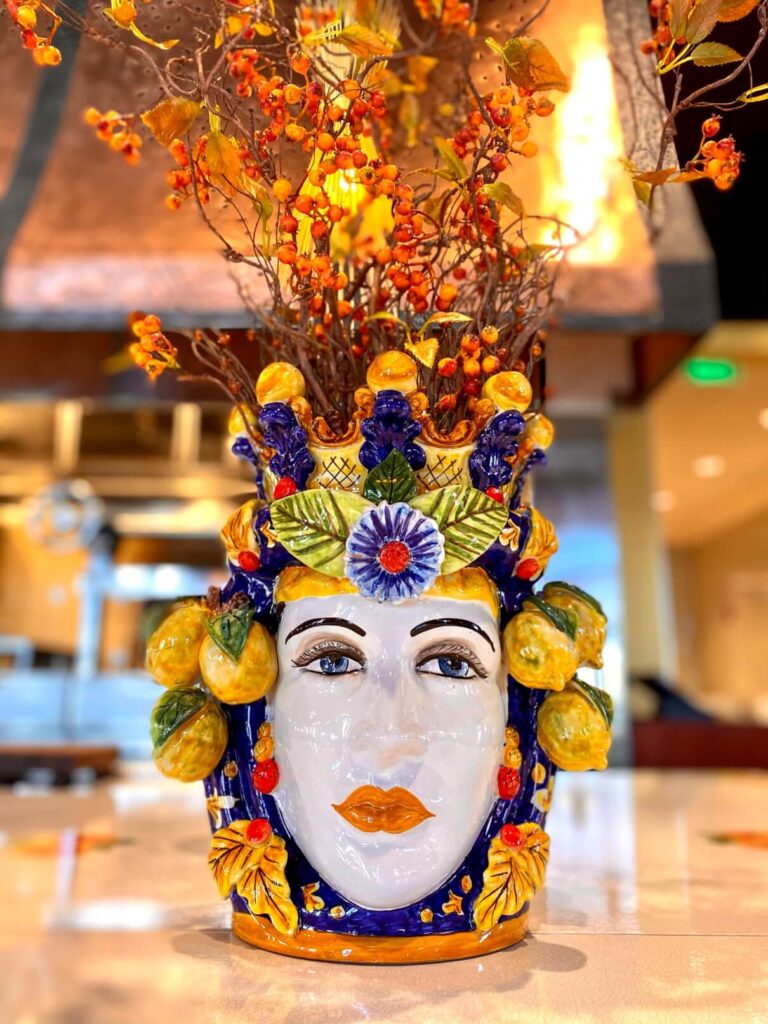Close-up shot of our artistic at our Casa Santo Stefano restaurant. Our artistic piece is composed of a diverse palette of colors raging from blue to yellow.